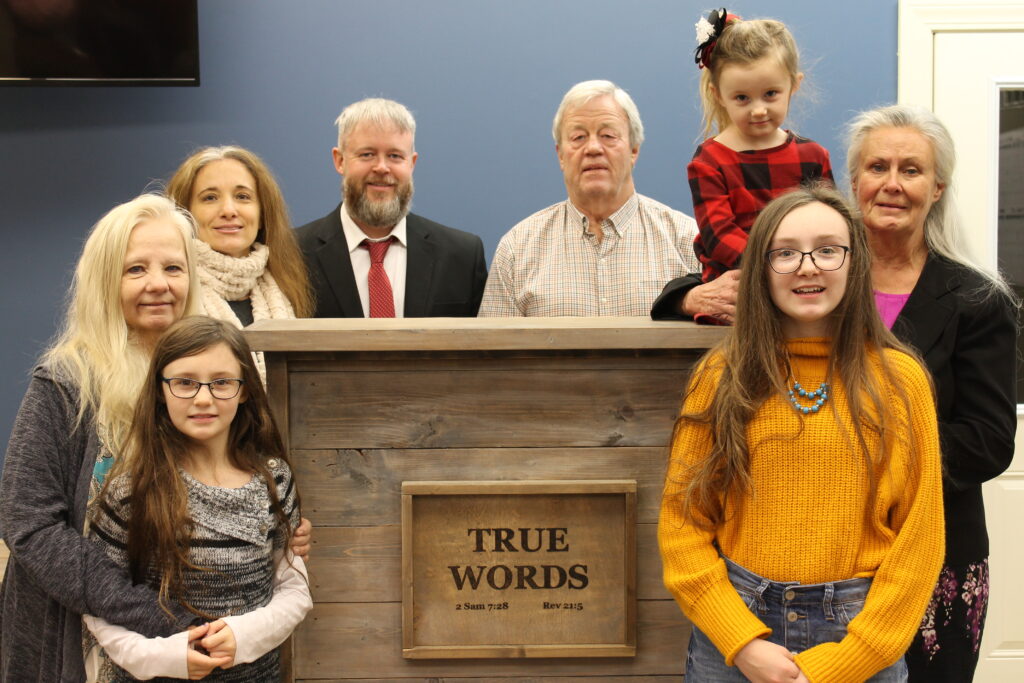 Joshua Tapp with his family at True Words Christian Church in 2020.