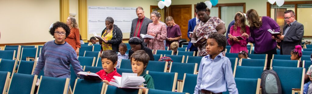 Alt Text: Pastor preaching at True Words Baptist Church, emphasizing sound doctrine and biblical truth.