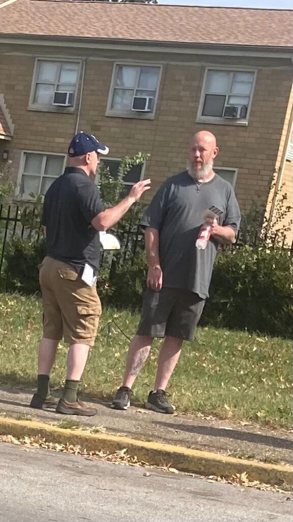 A group of Gospel preachers attempting to get people to believe in the Lord Jesus Christ.