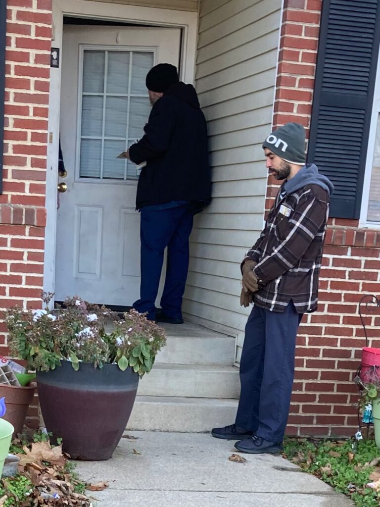 Joshua Tapp and Nathan Holmes out preaching the Gospel door to door in West Louisville, Kentucky