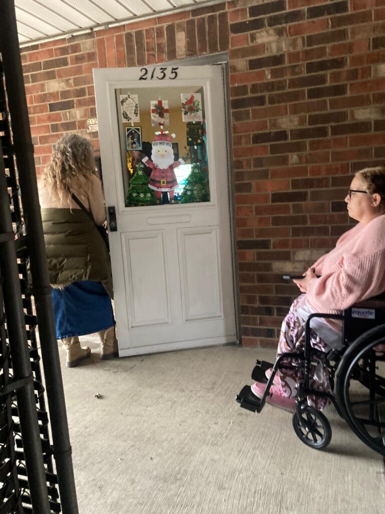 Church members from True Words Baptist Church engaging in door-to-door evangelism in Louisville, KY.